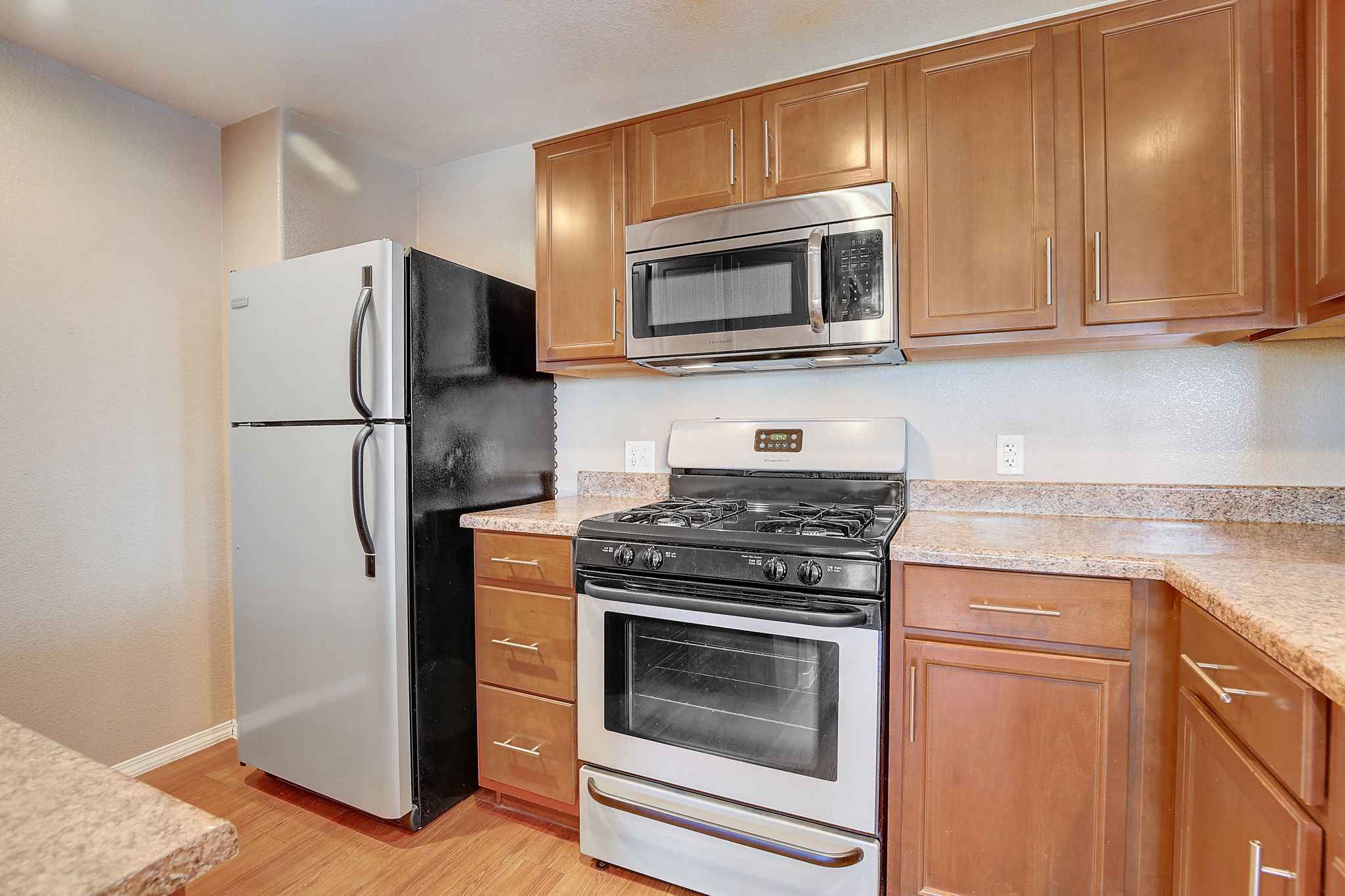 Apartment Kitchen Stove Top Microwave Oven Fridge Countertop