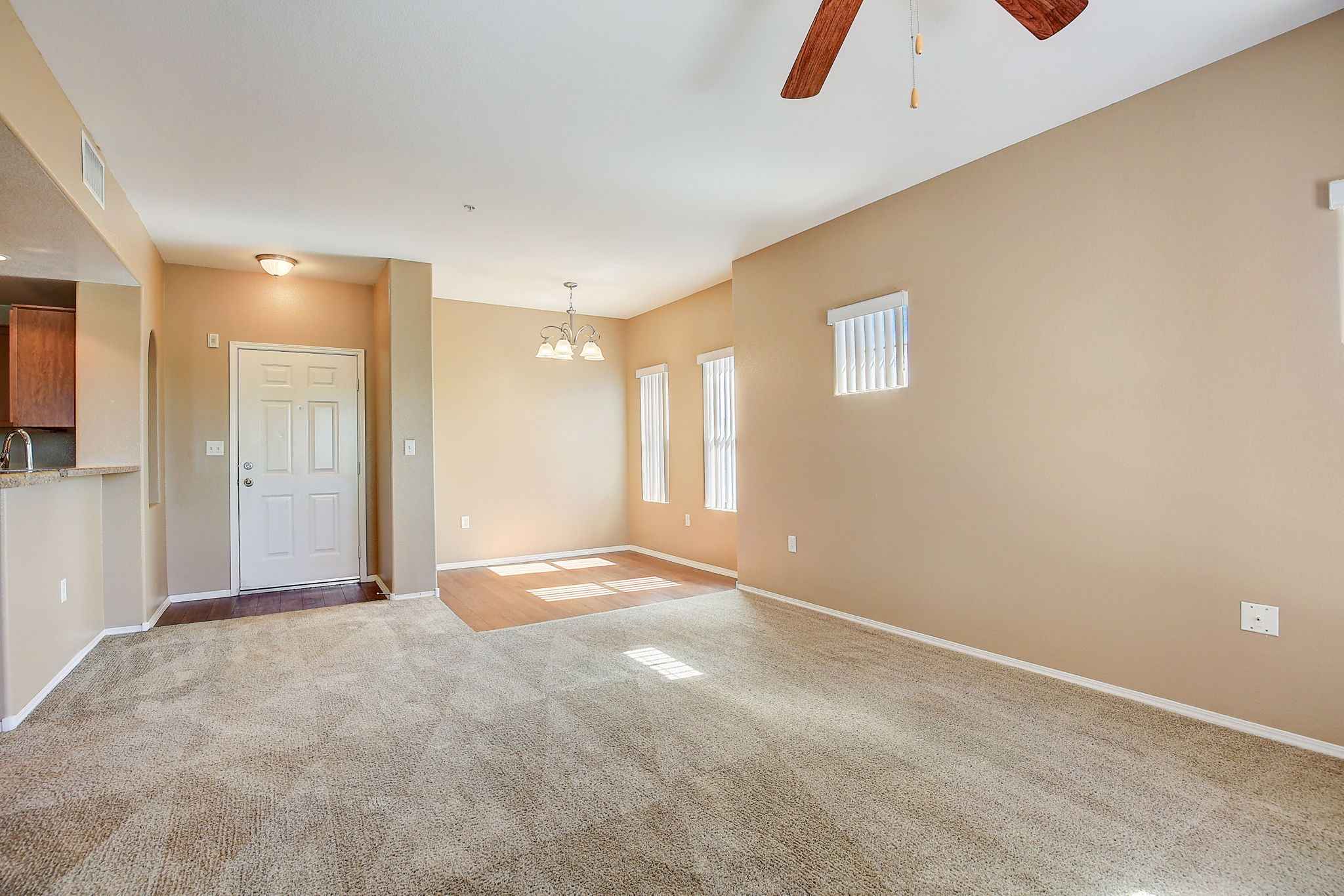 Apartment Livingroom Dining Area And Front Door Ceiling Fan